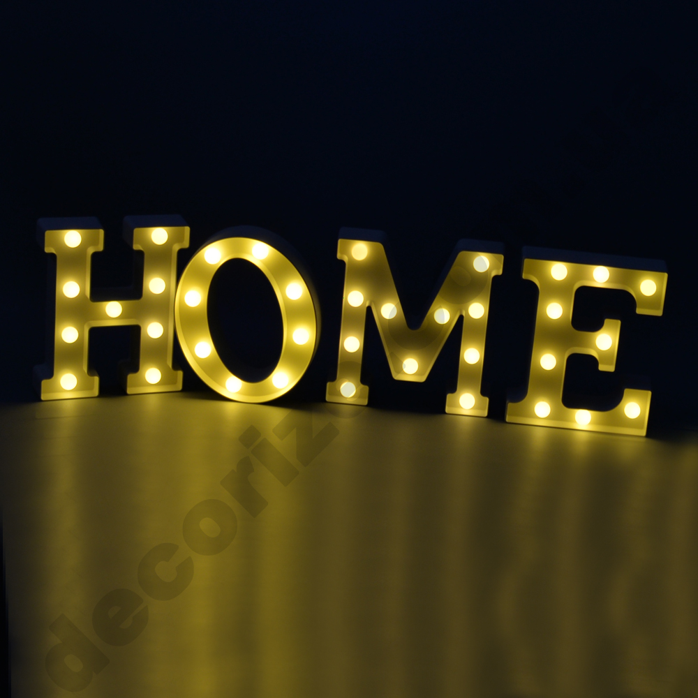 Слово "HOME" с подсветкой