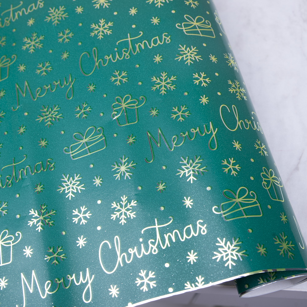 Папір металізований 2м. * 70 см merry christmas зелений