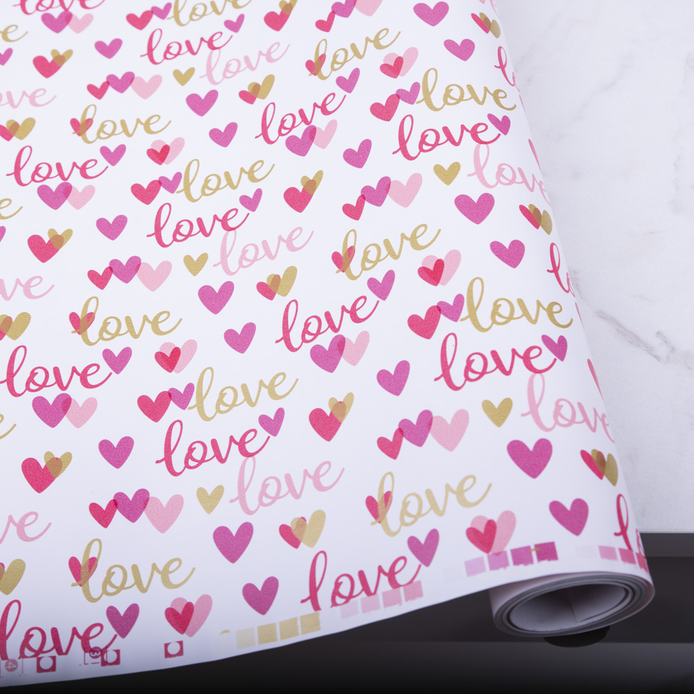 папір подарунковий 70см * 10м. love